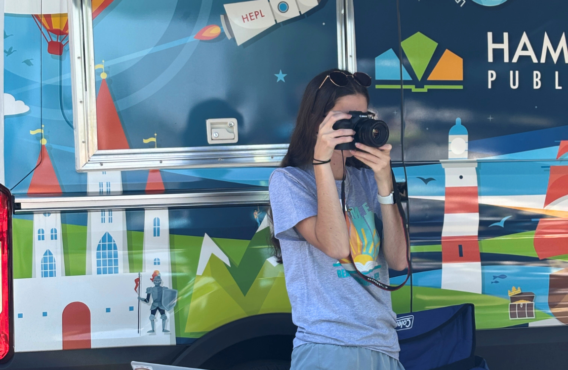 teenager taking a photo