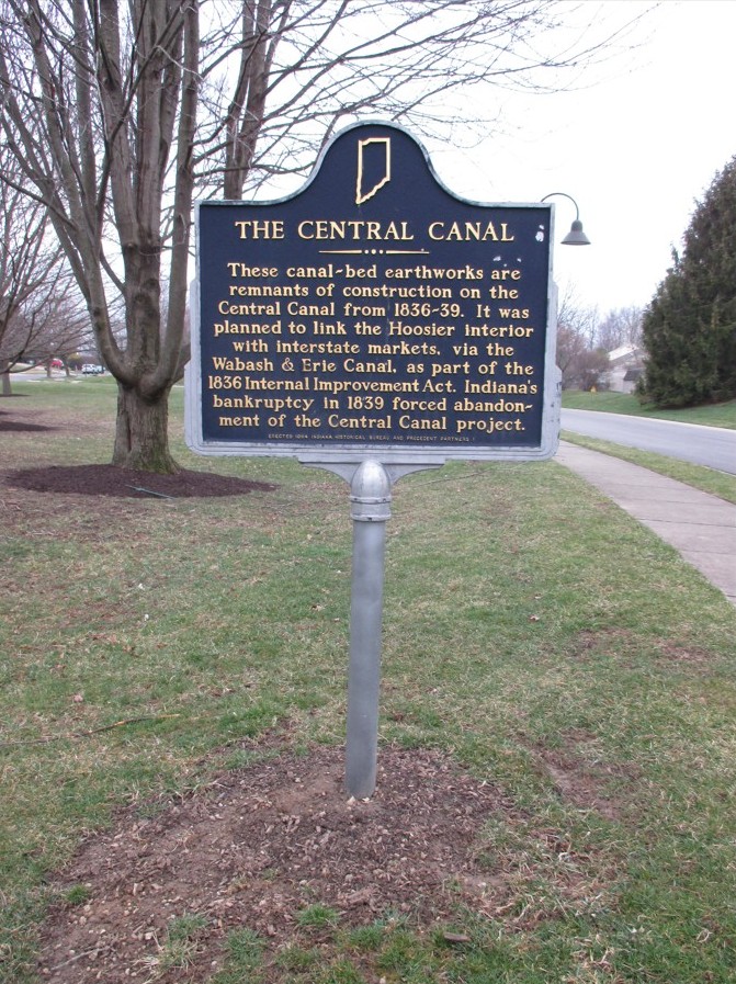 historic marker for canal in a neighborhood