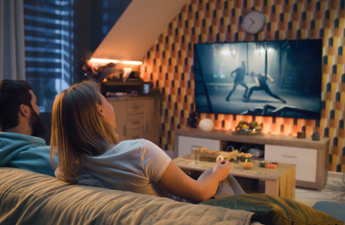 watching a movie a couple watching a movie at home