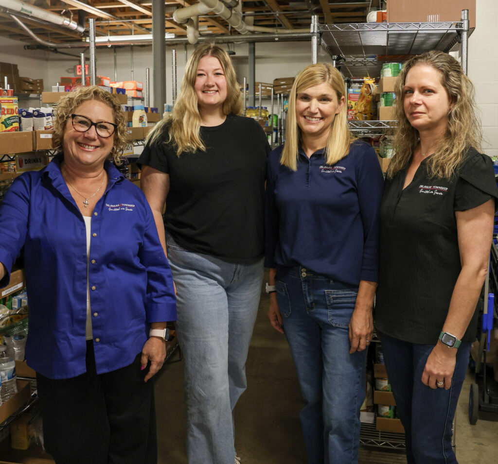 Four women in a food pantry