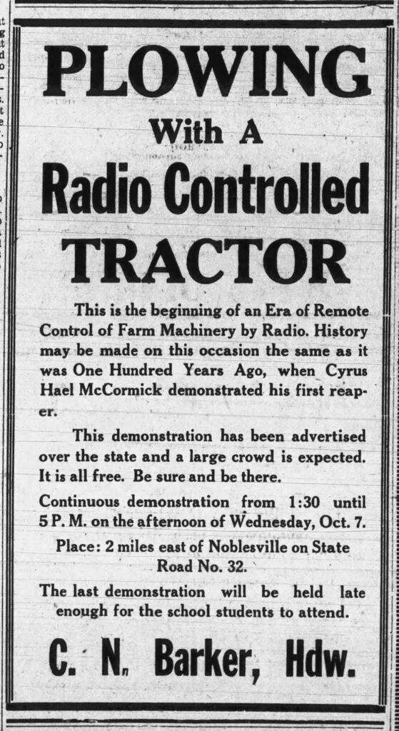 Newspaper clipping titled "Plowing with a Radio Controlled Tractor"