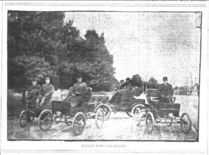 Newspaper image of early automobiles
